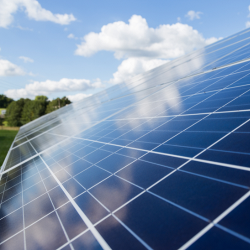 Solar panels reflecting the sky